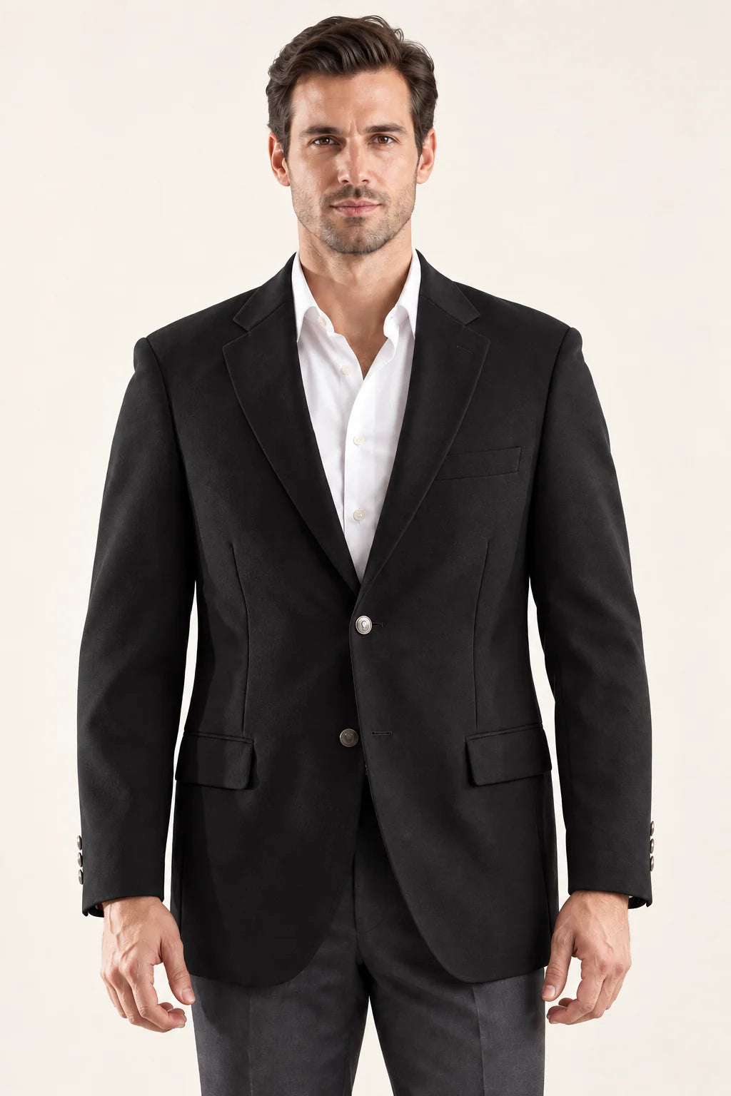 The Encore men’s black two-button blazer, front view styled with a white shirt and charcoal trousers