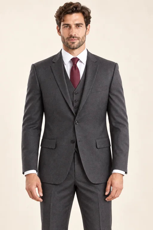 The Regent men’s charcoal classic-fit three-piece suit with matching vest, front view