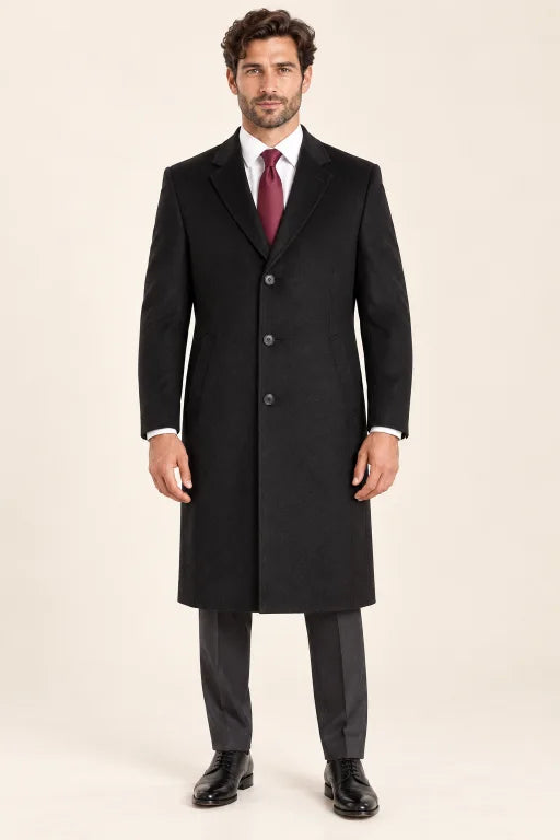 The Beaumont men’s black topcoat, front model view