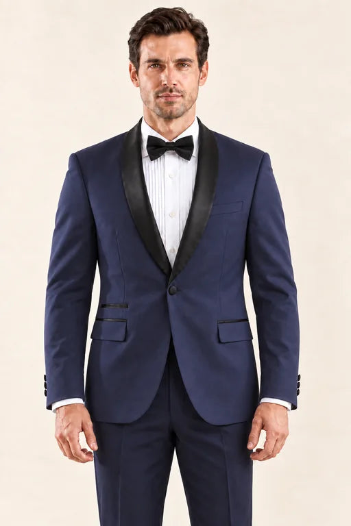 The Riviera men’s navy tuxedo, front view with black satin shawl lapels and matching navy trousers